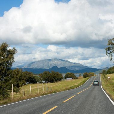 Norwegian road, mountains in the distance.
